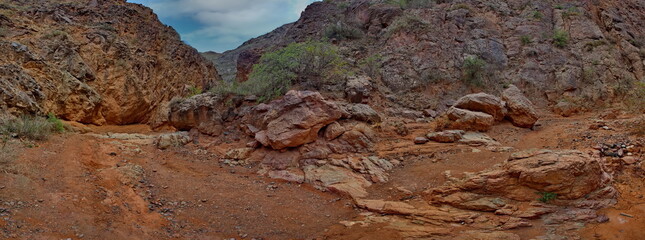 Northern Kyrgyzstan. Picturesque winding trails of the Kok Moinok canyons with red-brown rock along the Chu River.