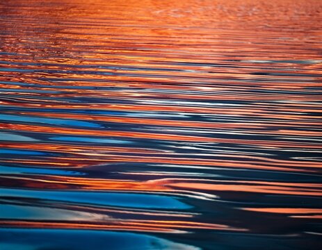 distorted reflections of vibrant stripes on water surface - Powered by Adobe