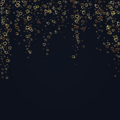 Gold hearts scattered on black background.