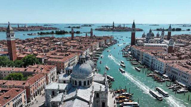 Aerial view of venice grand canal with santa maria della salute church and historic building in italy 4k video