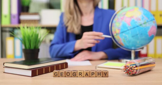 Map exploration and geography lessons come to life with an interactive globe in a bright classroom - Powered by Adobe