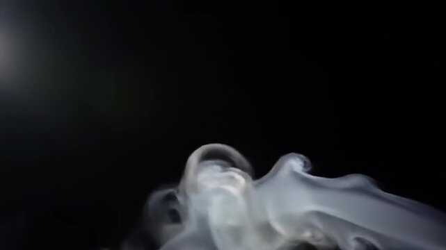 Ethereal Smoke Dance - A Mesmerizing Display of Light and Shadow.