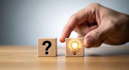 From question to solution hand placing a lightbulb block next to a question mark block on a wooden surface