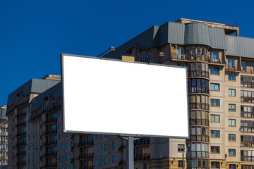 Obraz premium Background for design, white billboards on city streets and along roads in the summer day