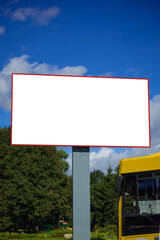 Background for design, white billboards on city streets and along roads in the summer day