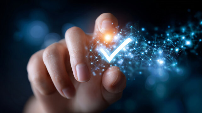 Confident human hand with finger touching glowing digital checkmark on screen. positive concept of technology, approval, and success