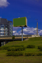 Background for design, billboards on city streets and along roads in the summer day