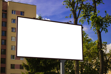 Background for design, billboards on city streets and along roads in the summer day