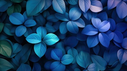 Blue leaves of various sizes with gradient colors from light to dark blue arranged in abstract pattern on background