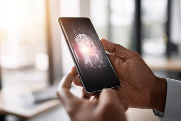 Two factor authentication on phone with fingerprint scan for secure access in modern office environment, technology and security concept