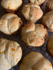 NC Hville Clover Leaf Cheddar Rolls Close-Up Vertical 2025