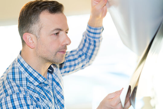 a technician is working in a factory