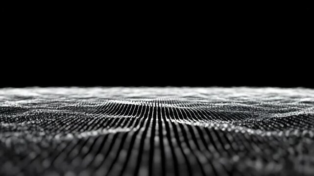 Abstract digital wave surface made of glowing white particle dots creating a futuristic technology or data flow visualization on black 4k video - Powered by Adobe