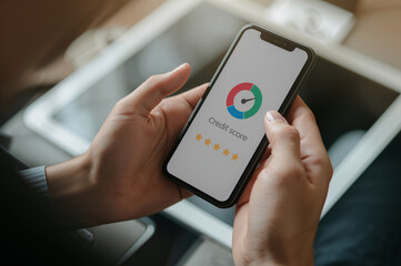 Person holding a smartphone displaying a health and fitness app dashboard