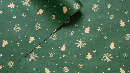 Green Christmas background with snowflakes and christmas trees,seamless pattern of christmas trees and snowflakes on green background,Christmas wrapping paper, Xmas pattern with ornaments.