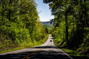 Afton, Virginia Blue Ridge mountains highway landscape and cars in spring with green trees