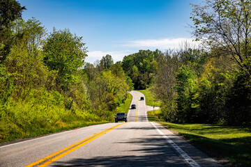Afton, Virginia Blue Ridge mountains highway landscape and cars in springtime with green trees