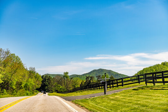 Afton, Virginia Blue Ridge mountains highway landscape and cars in springtime with mailbox and mowed lawn