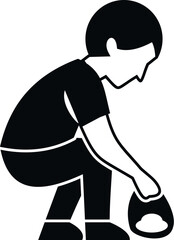 Child crouching, picking up trash into a bag, promoting cleaning