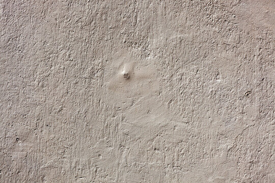 Close-up of white concrete textured plaster wall backgoround.