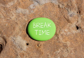 Break time symbol. Concept word Break time on beautiful green stone. Beautiful red brown stone background. Business break time concept. Copy space.