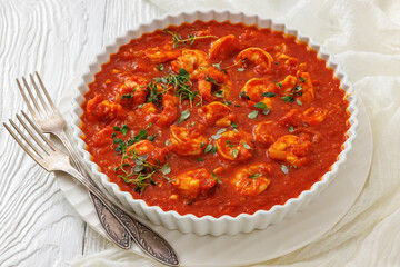 Shrimp in hot tomato sauce with garlic, onion