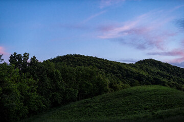 Obraz premium Virginia Blue Ridge Mountains parkway in beautiful evening dark night sunset at Reeds gap road with colorful twilight blue purple sky