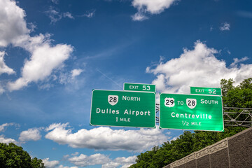 Virginia interstate highway i-66 with Dulles International Airport IAD exit sign to Centreville