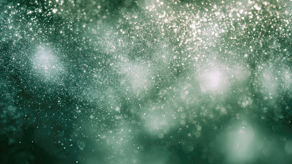 A sparkling emerald green abstract background featuring countless shimmering particles and soft bokeh lights, creating a magical, festive, and dreamy atmosphere.