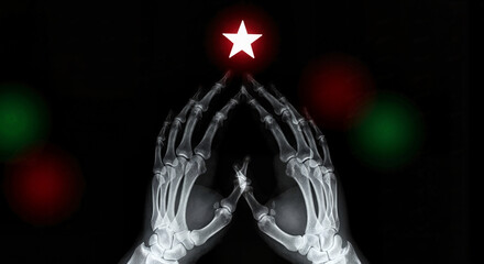 X-ray hands shaped like a Christmas tree with a star for radiologist holiday greetings and medical marketing materials