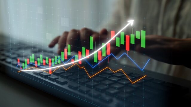 A close-up view of hands on a keyboard with stock market charts displayed, showcasing upward trends in finance and investment analysis, representing market growth. Copula
