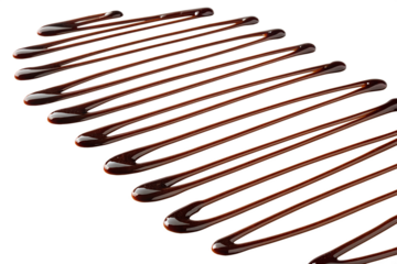 Sweet dark chocolate syrup creates shiny parallel wavy lines, beautifully drizzled as an isolated decorative pattern for desserts.