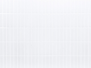 White tile wall background with clean geometric pattern. Ceramic surface design suitable for interior, bathroom, kitchen, architecture, and decorative concepts.