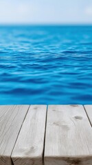 Fototapeta premium Tranquil blue ocean and wooden pier under clear sky