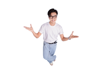 Cheerful Expression: A young man with glasses and a warm smile stands with arms outstretched, inviting and welcoming, exuding positivity.