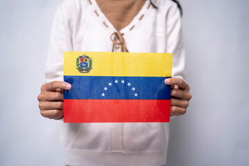 Person Holding the Official National Flag of Venezuela