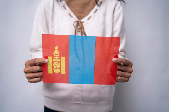 Person Proudly Holding the National Flag of Mongolia