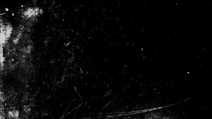 Monochrome grunge texture with scratches and paint splashes creating a dynamic visual backdrop for creative projects.