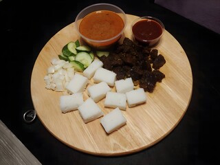 Stickless Beef Satay served with Rice Cakes, Sambal and Peanut Sauce