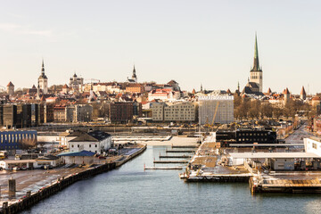 Tallinn, Estonia. Aerial view of the Old Town from a harbor ferry showing the main church towers, including St Olaf, and several key defensive towers of the medieval city walls