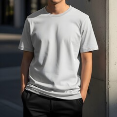 Blank Light Grey Crew Neck T-Shirt Mockup on a Male Model Standing Outdoors, Perfect for Custom Design, Branding Presentation, and Casual Apparel Showcase