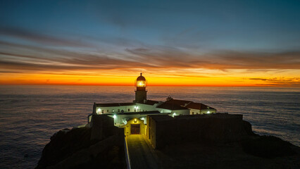 Aerial from the lighthouse Cabo Vicente at Sagres in Portugal at sunset