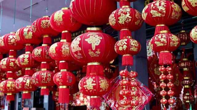 Red Chinese Lanterns with Gold Decorations Hanging at Traditional Market for New Year Celebration