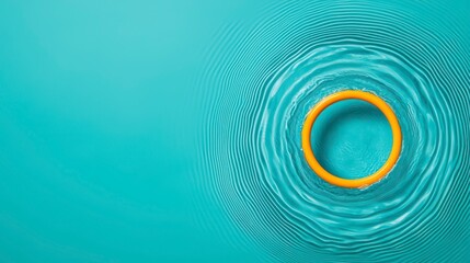 A vibrant image of a circular orange object creating ripples in a turquoise water surface, evoking calmness and tranquility.