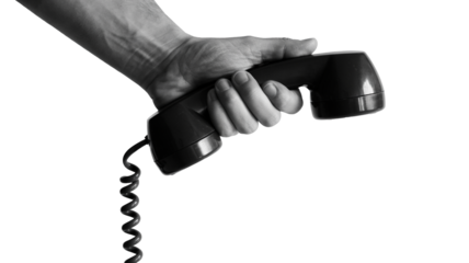 Human hand holding receiver of telephone ready to talk, communications and connection concept