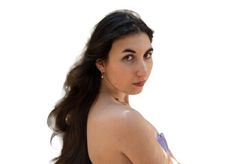 Obraz premium Young woman looking back with intense gaze portrait