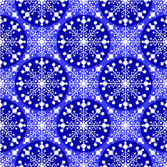 Falling snowflakes against a blue sky. Snowy decorative background. Abstract geometric seamless pattern in white and blue. Vector pattern.