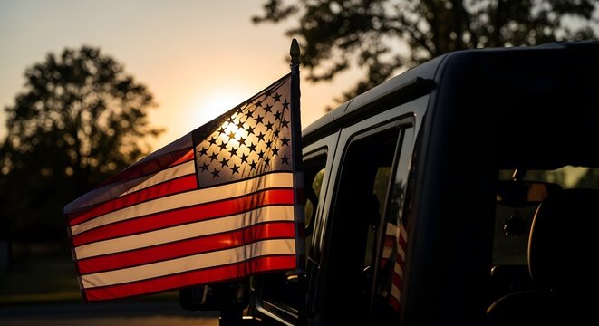 American flag attached to a vehicle at sunset patriotic display