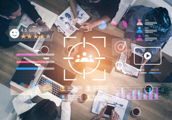 A diverse team collaborates in a modern workspace, analyzing data and strategizing for growth....