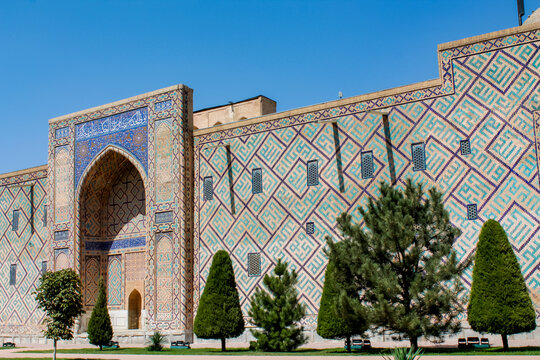 Uzbekistan architecture in Samarkand and Bukhara with intricate mosaics blue domes ancient madrasas Islamic patterns historic monuments vibrant tilework and cultural heritage in bright daylight - Powered by Adobe
